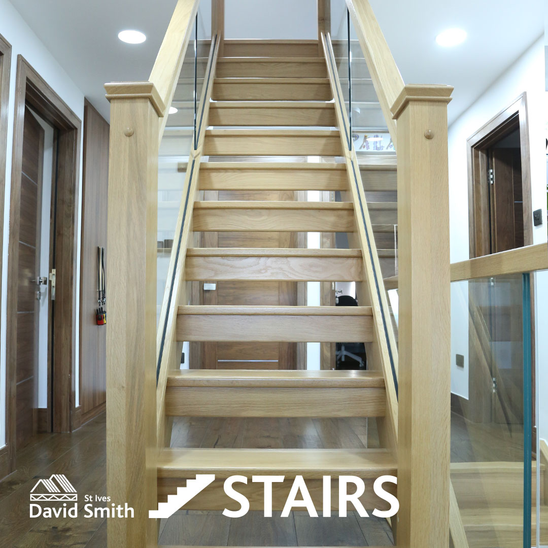 Wooden staircase with glass sides.