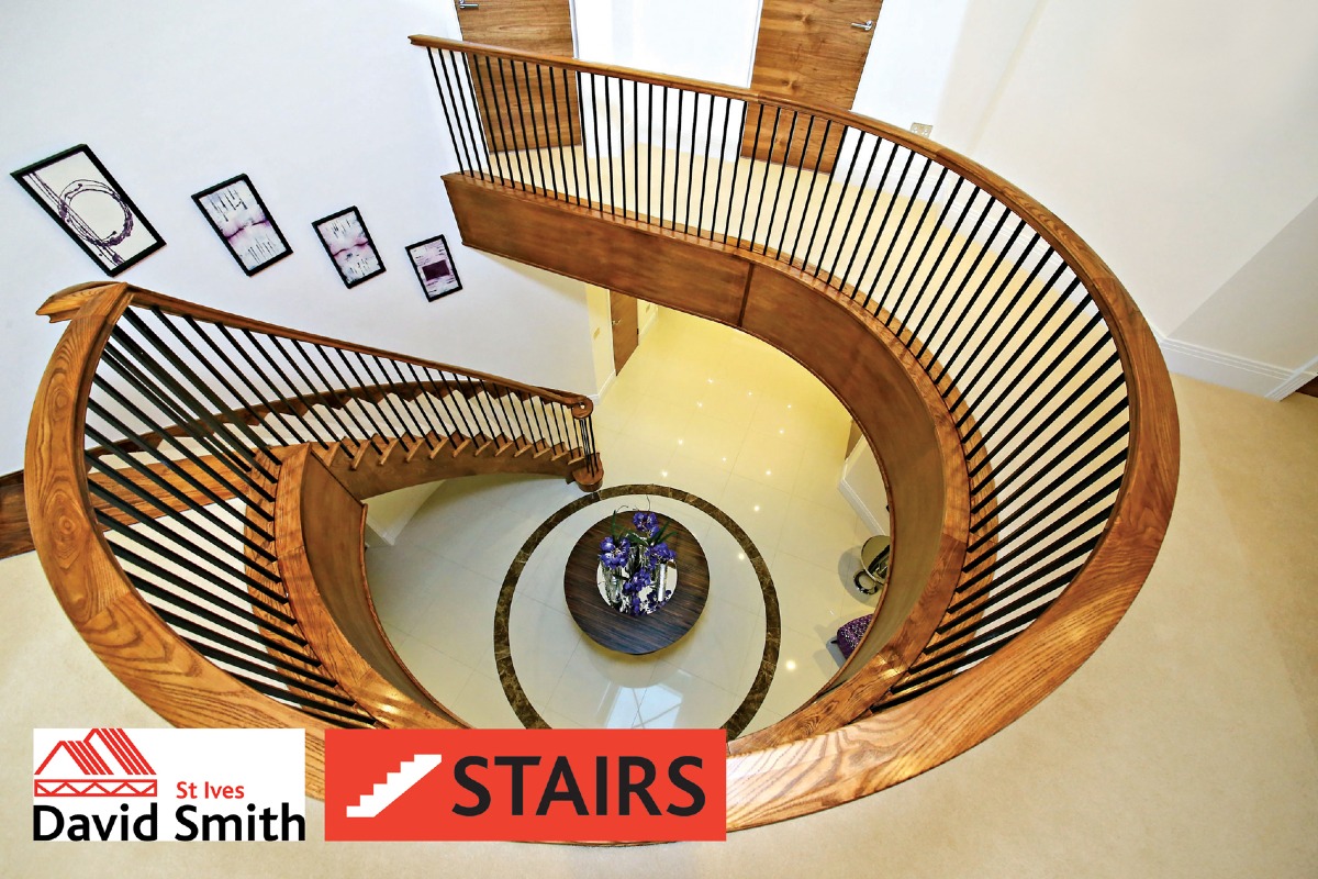 View of spiral staircase from the top of stairs