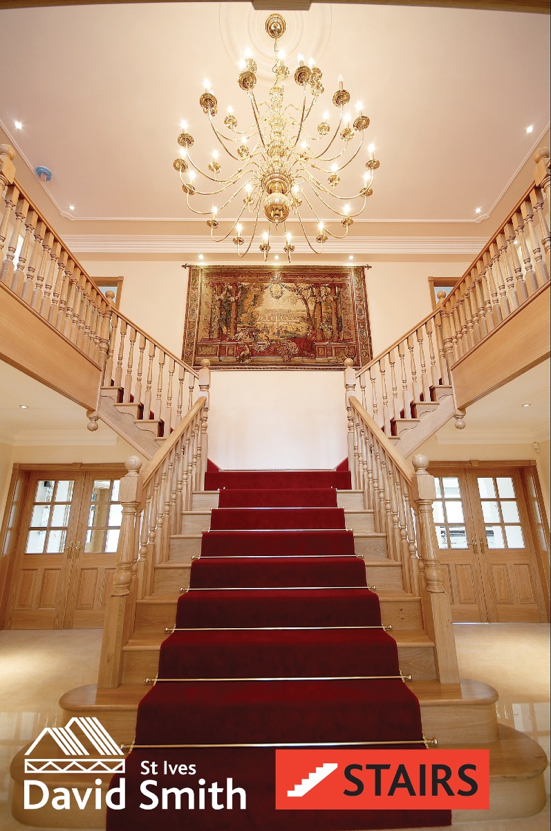 Grand staircase with red stair runner