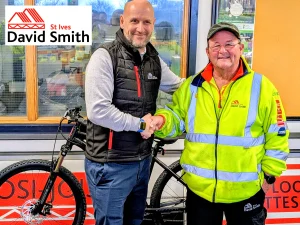 Two men shaking hands.