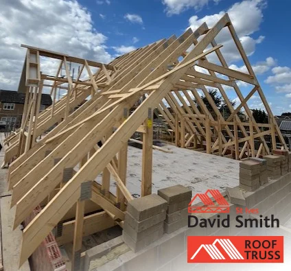 Attic Trusses and Posi-Joist Metal Web Joists on a home on a sunny day.