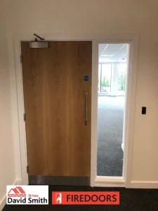 Door fitted with a screen