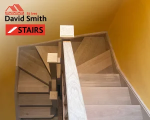 Oak stairs with yellow wall