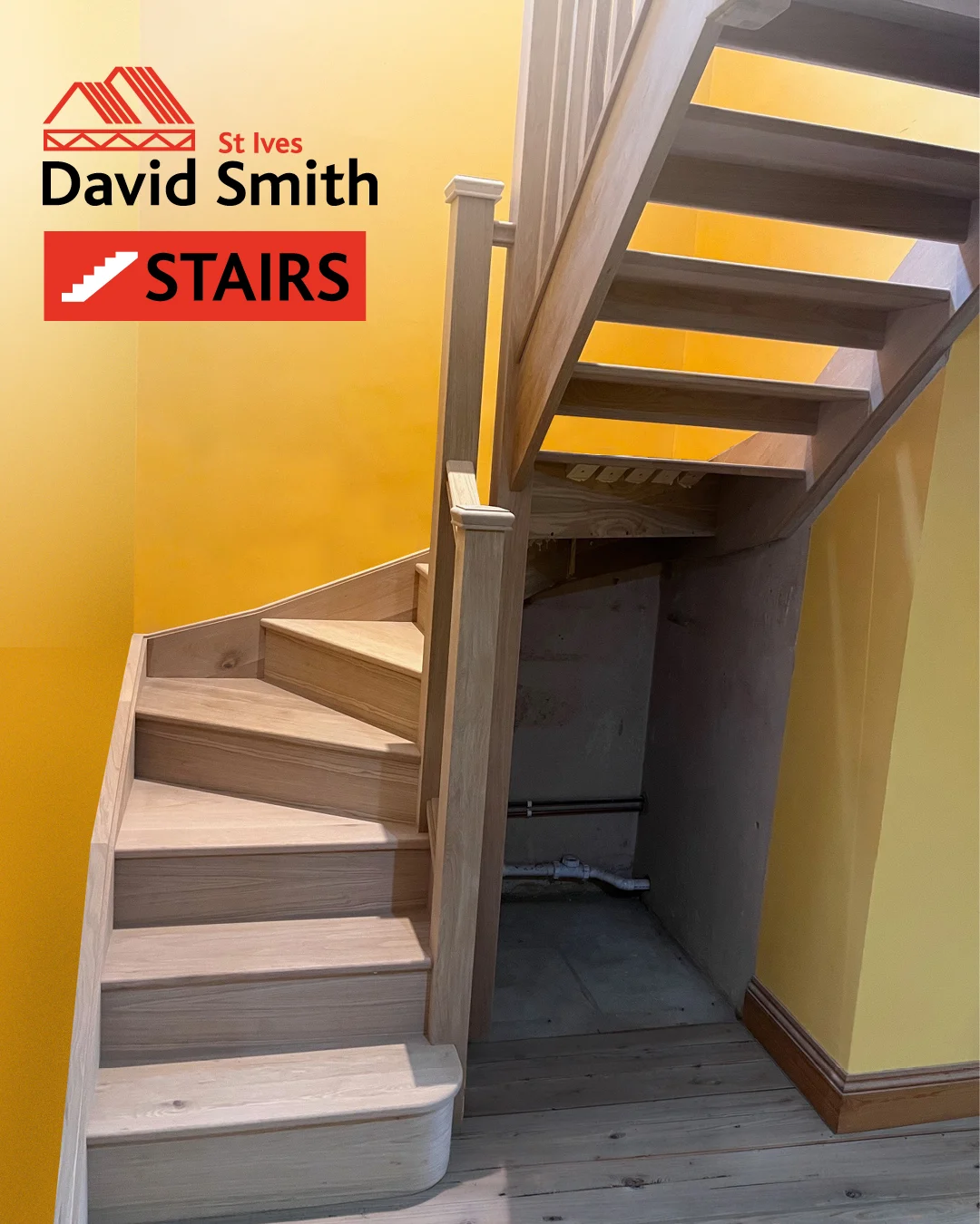 Spiral stairs in a yellow room