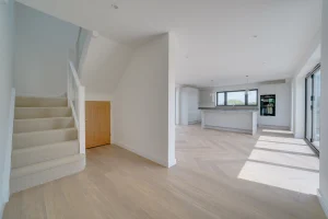 Carpeted stairs in a newly renovated room