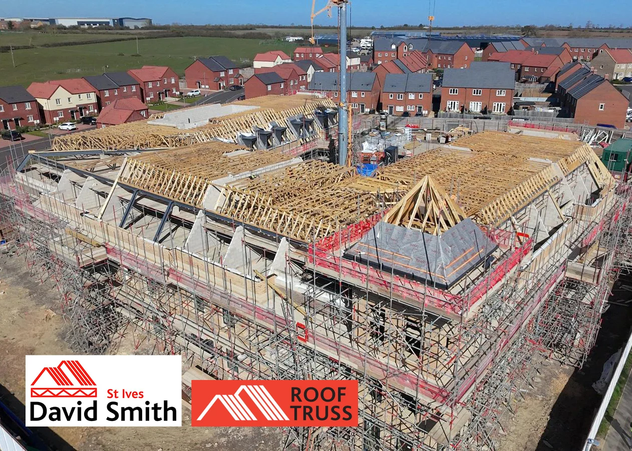 building under construction covered in scaffolding