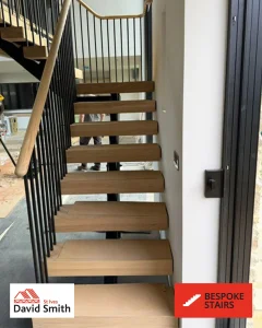 oak staircase ascending to another fall