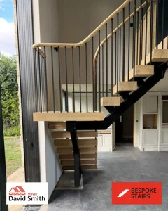 oak staircase descending from a higher floor